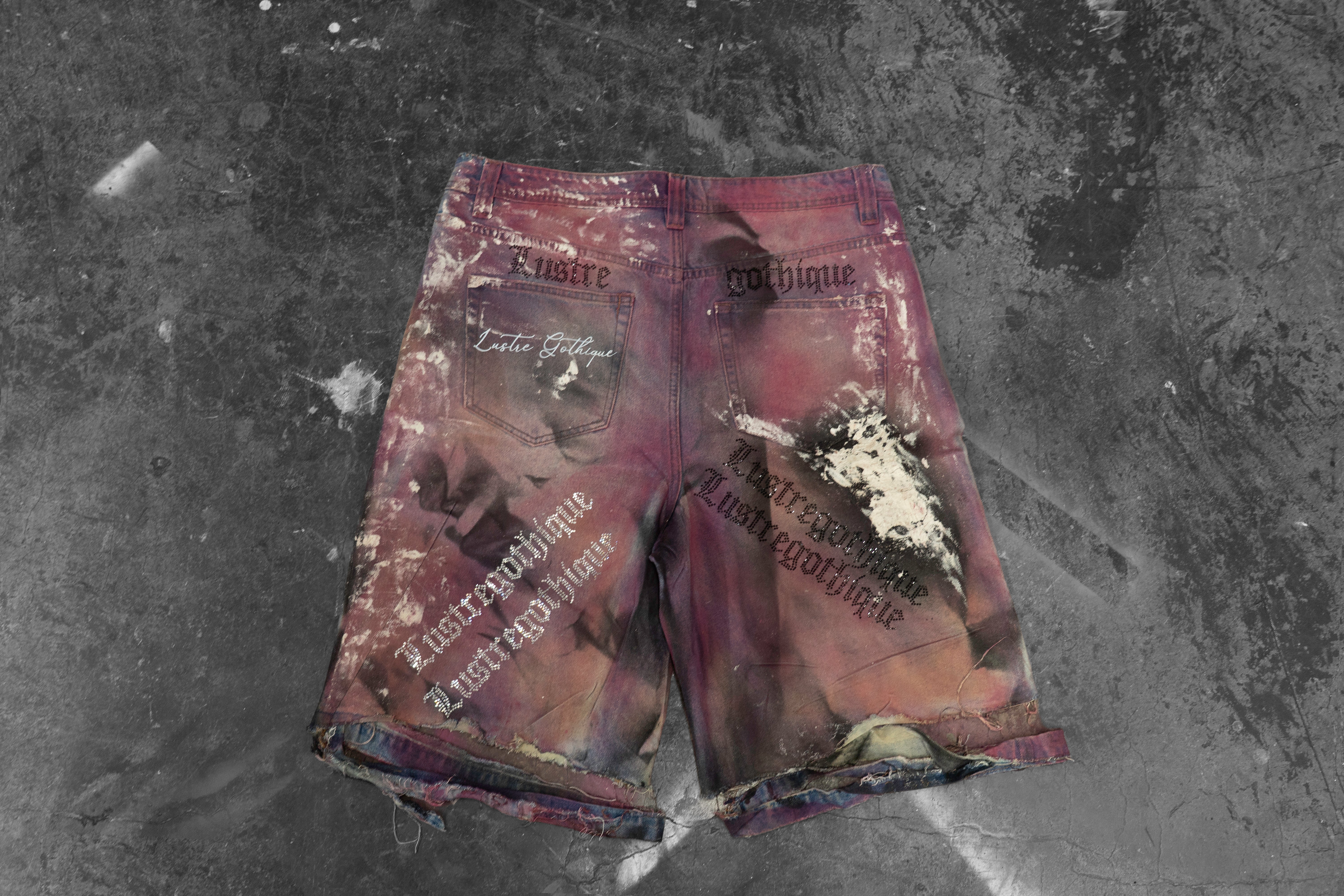 LUSTREGOTHIQUE — DISTRESSED HAND-TREATED PINK DENIM SHORTS